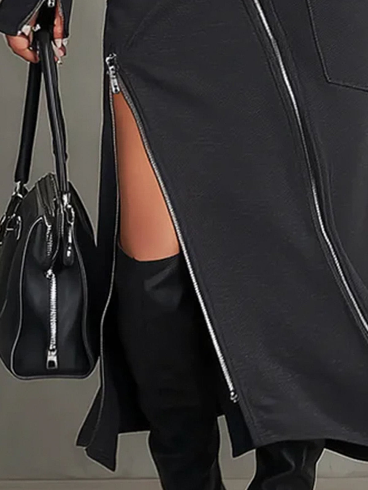 Conjunto de cuello alto con diseño irregular y bolsillos con cremallera