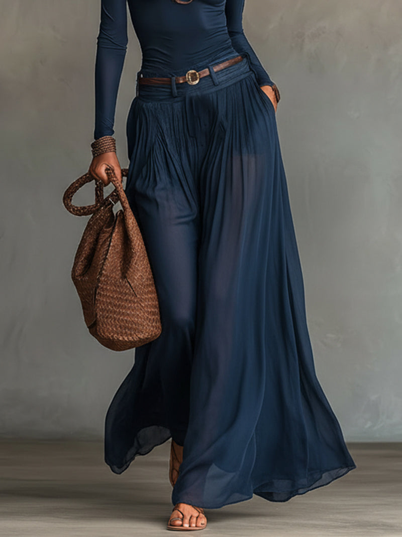 Conjunto de dos piezas: top azul marino de un solo hombro y falda de tul transparente (con cinturón)