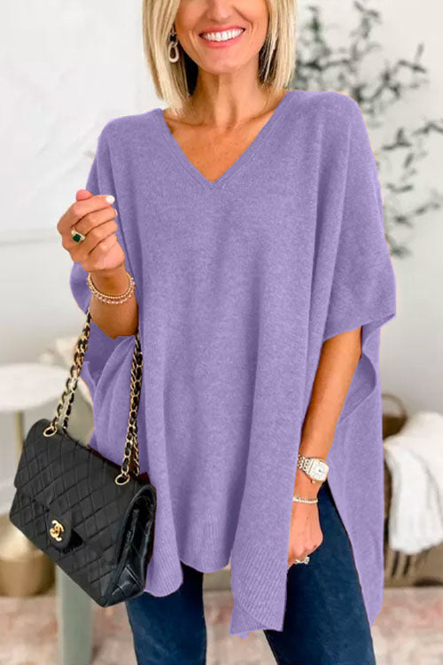 Suéter tipo poncho liso de corte holgado con cuello en V, muy elegante
