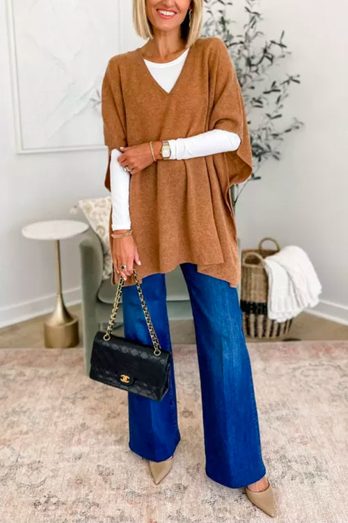 Suéter tipo poncho liso de corte holgado con cuello en V, muy elegante