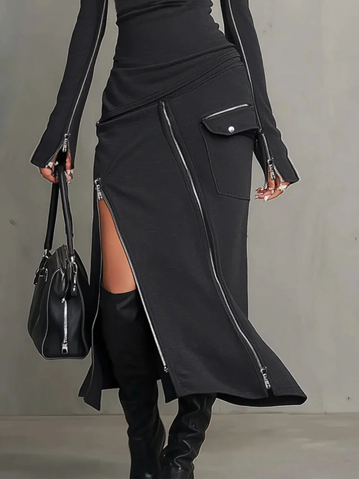 Conjunto de cuello alto con diseño irregular y bolsillos con cremallera