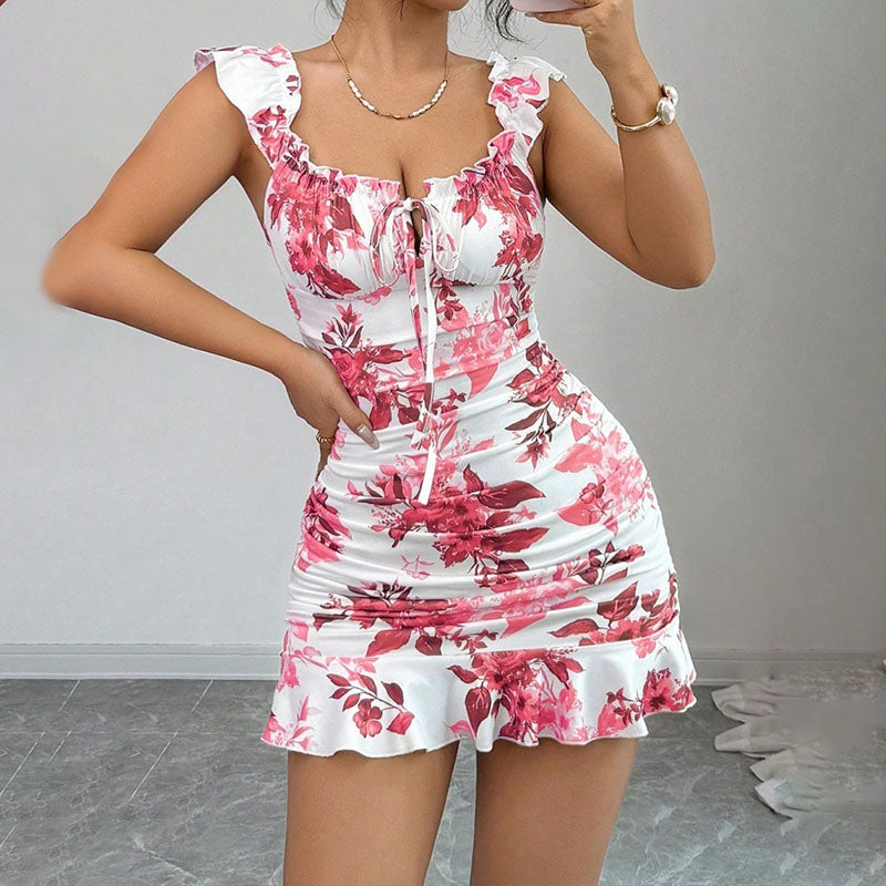 Vestido entallado con cordones delanteros, volantes y cintura ceñida