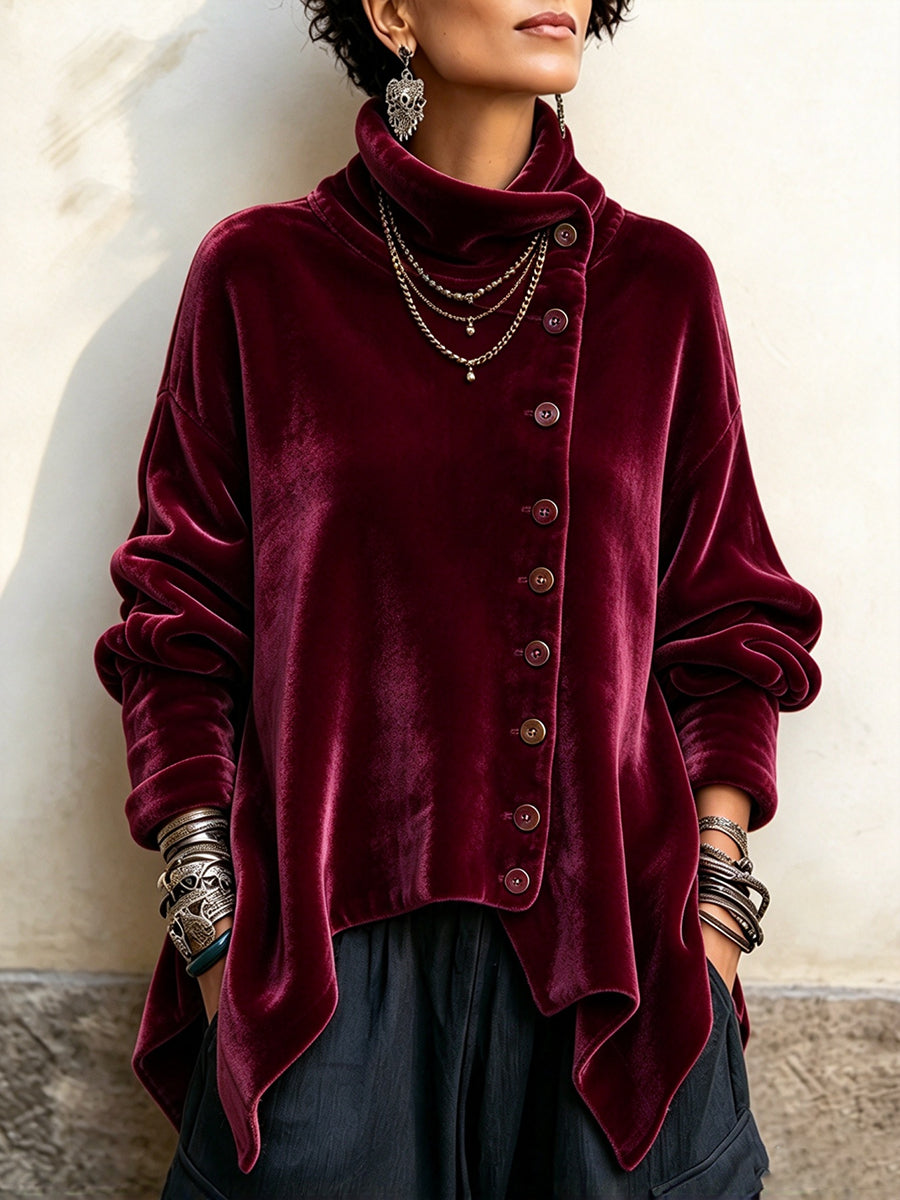 Top de terciopelo con cuello alto asimétrico y botones