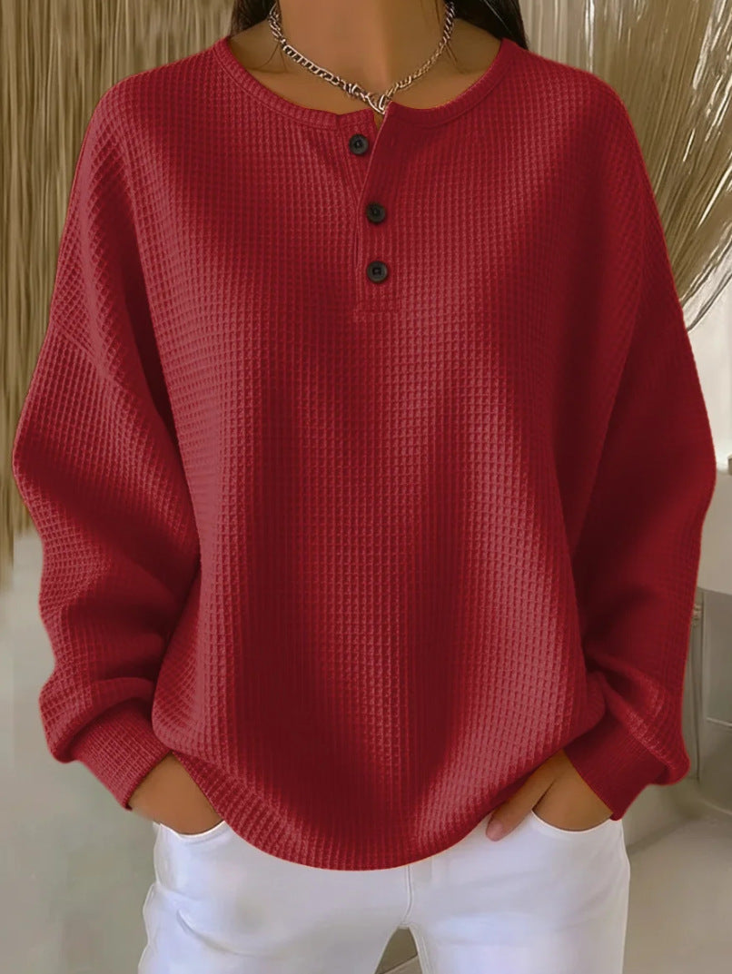 Top de punto tipo waffle con detalle de botones