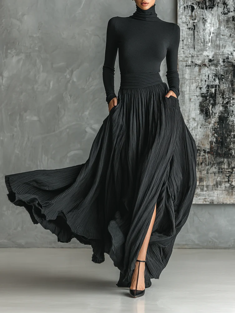 Conjunto de moda completamente negro con camiseta ajustada de cuello alto y falda plisada