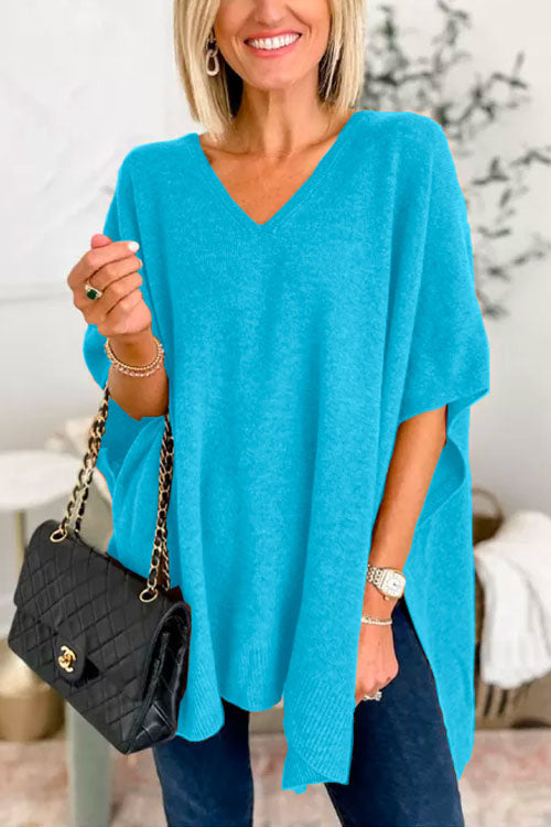 Suéter tipo poncho liso de corte holgado con cuello en V, muy elegante